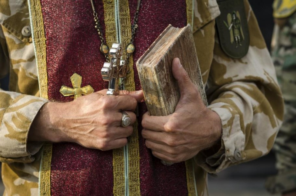 Preot rus, arestat după slujba din Duminica Iertării, pentru că a predicat împotriva războiului